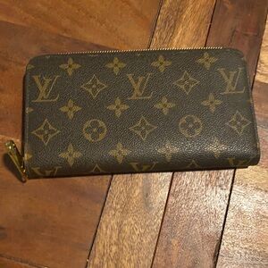 Faux Louis Vuitton wallet.